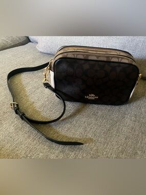 Make offer Coach Black and Brown Signature Canvas Crossbody Bag